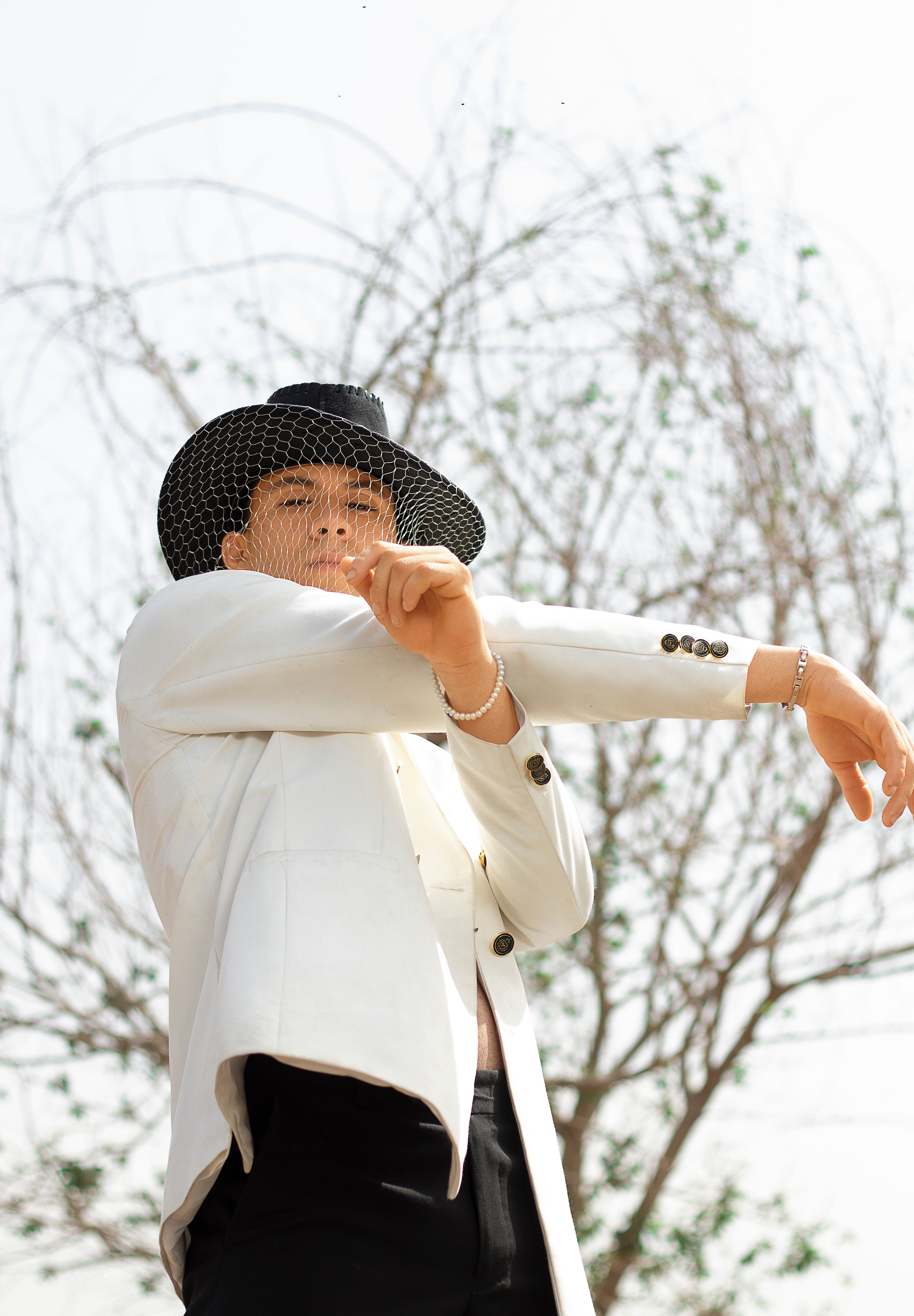 Man in White Suit and Black Hat · Free Stock Photo