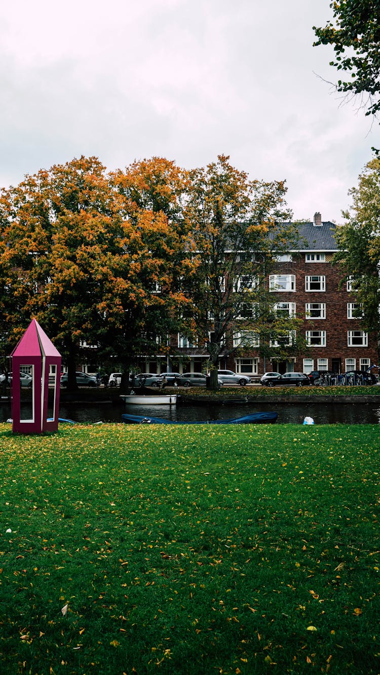 Apartment Building By The Canal In Amsterdam