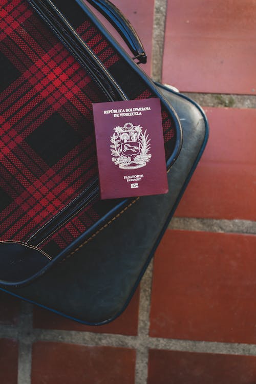 Venezuelan Passport on Suitcases