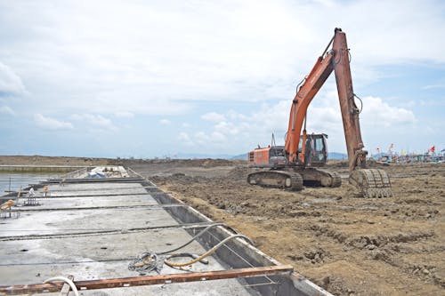 Backhoe Digging on Construction Site