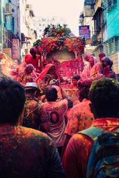Colorful street scene capturing a lively Holi festival in India, showcasing traditional celebrations.