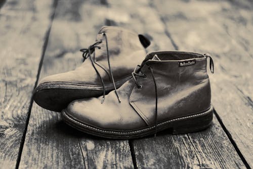 Chukka Boots On Parquet Floor