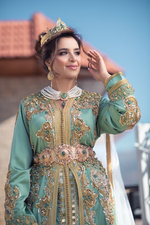 Free A stunning bride in traditional Moroccan dress with intricate details, set in Marrakech. Stock Photo