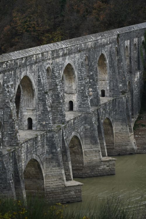 Free Historic Maglova Aqueduct spanning the Kastel River in Istanbul, a remarkable Byzantine architectural feat. Stock Photo