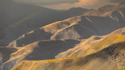 Безкоштовне стокове фото на тему «гірський хребет, гори, Захід сонця»