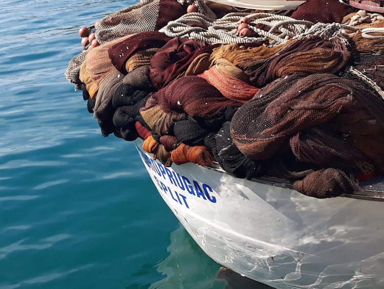 Fishing Nets On White Boat