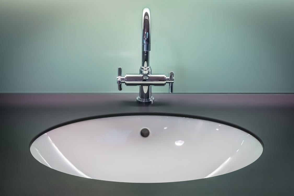 Free Black and White Vanity Top With Stainless Steel Faucet Stock Photo