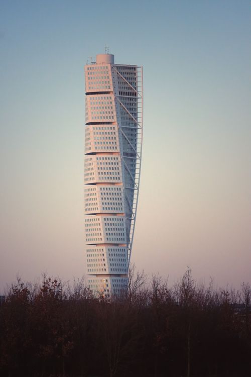 Free The iconic Turning Torso skyscraper in Malmö under a beautiful dusk sky. Stock Photo