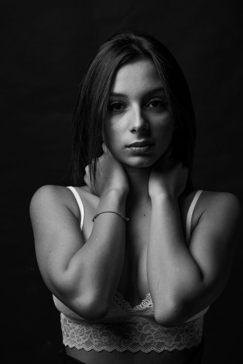 Free Striking black and white portrait showcasing a woman's elegance and beauty. Stock Photo