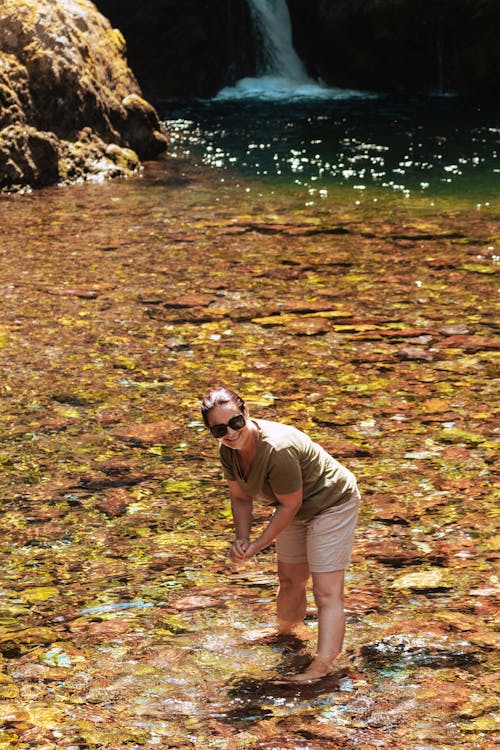 Woman in a Rocky Stream