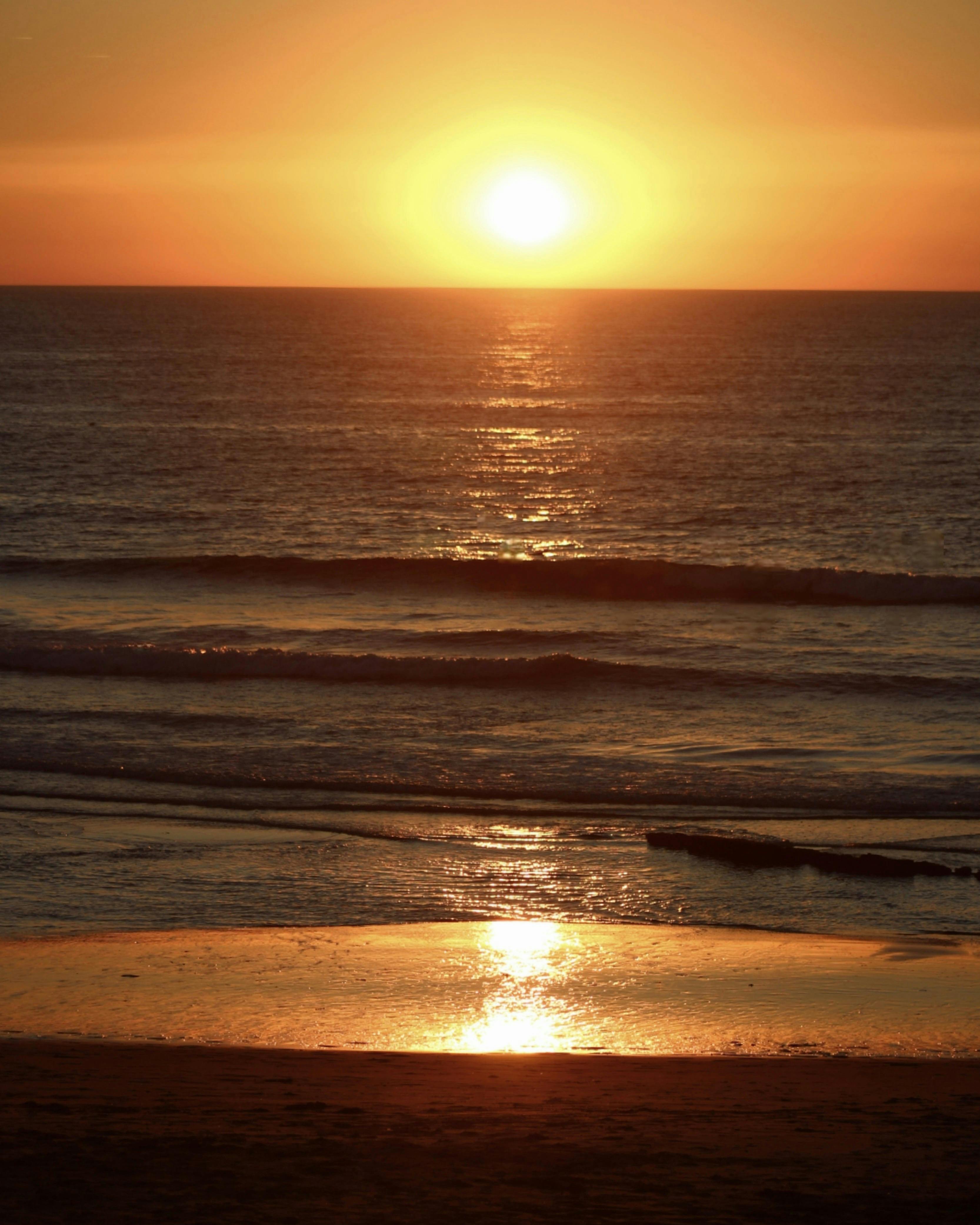 Seaside City at Sunset · Free Stock Photo