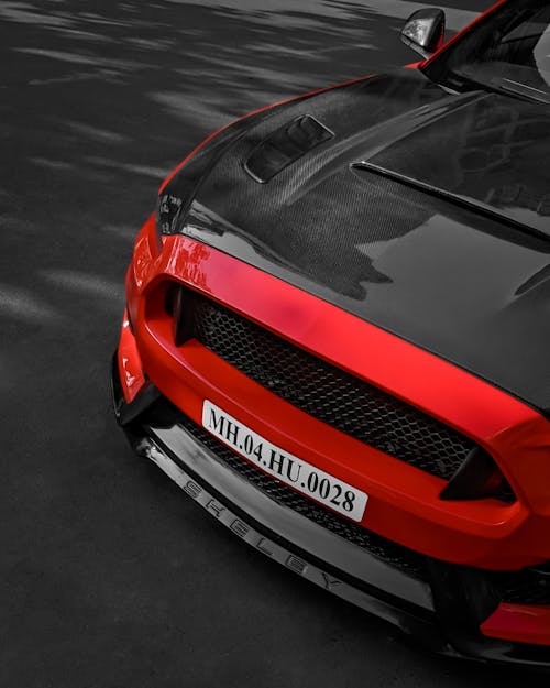 Red and Black Car on a Street