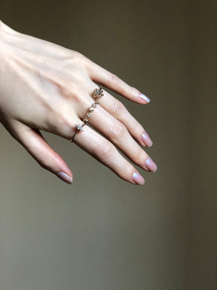 Photo Of A Hand Wearing Rings