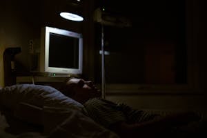 Man Lying on Bed in the Hospital