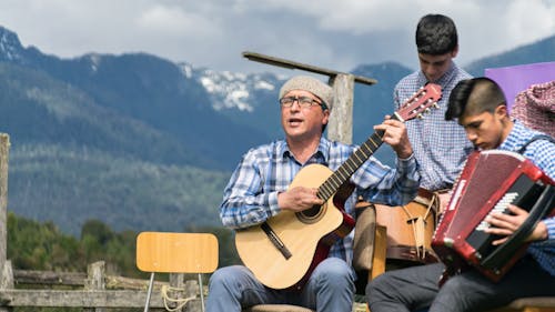 Men Playing Musical Instruments Outdoor