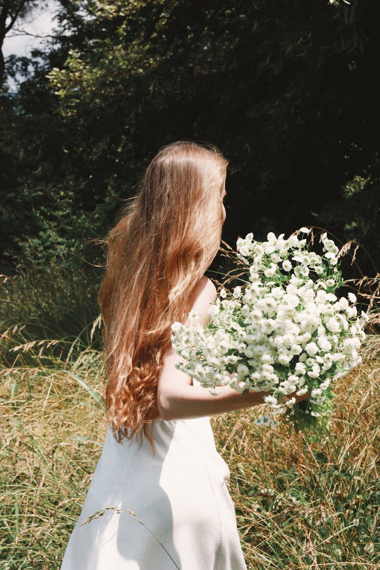 A Girl With Flowers