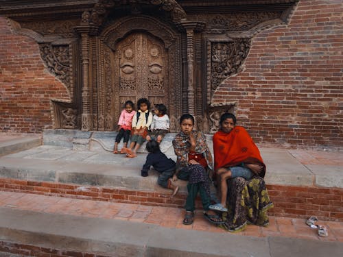 People Sitting on the Street