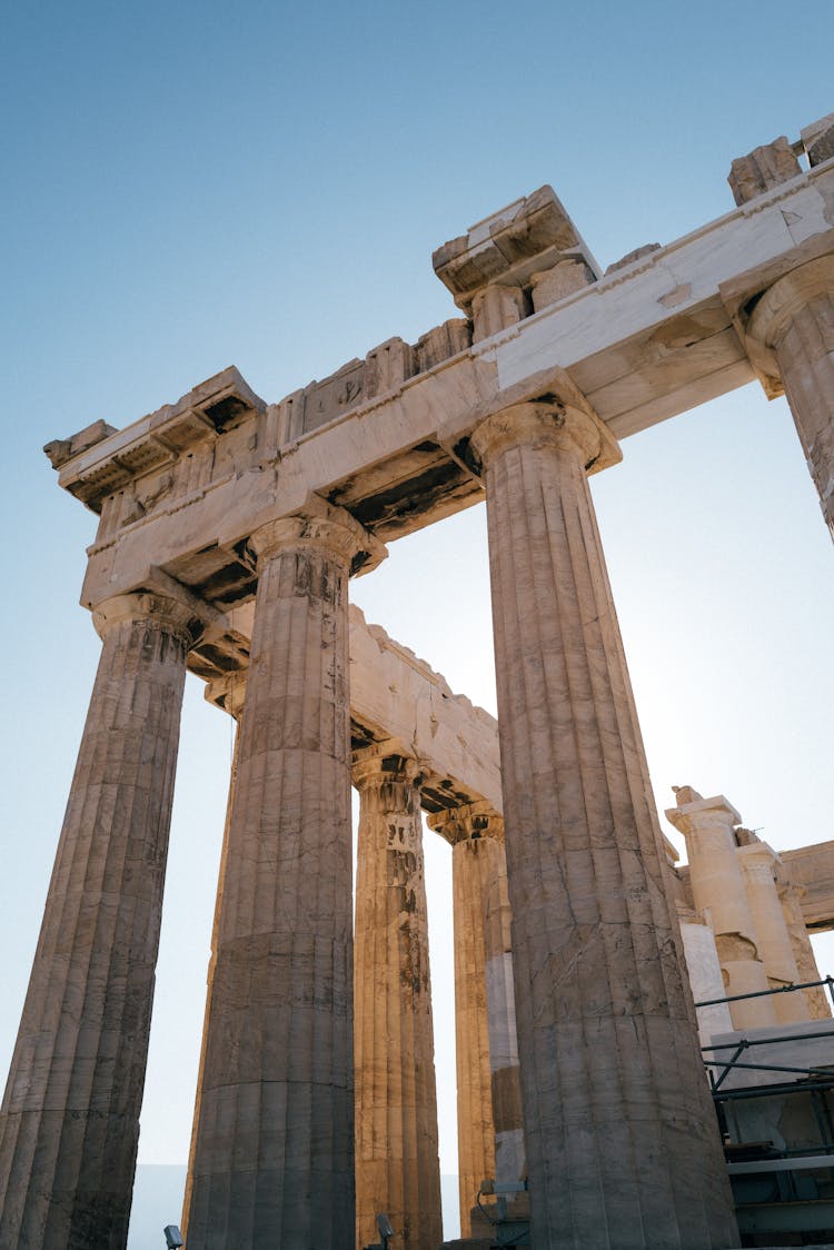 Columns Of Ancient City Ruins On Blue Sky