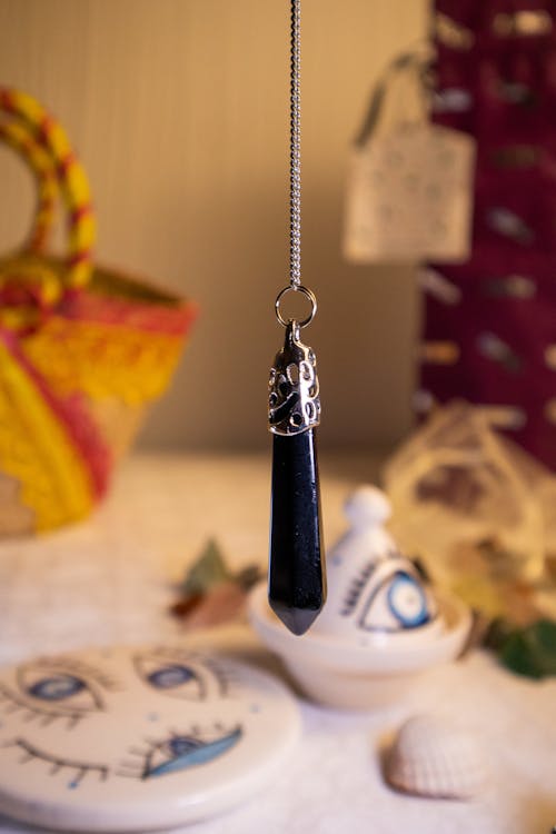 Close-up of a Pendant with a Black Stone 