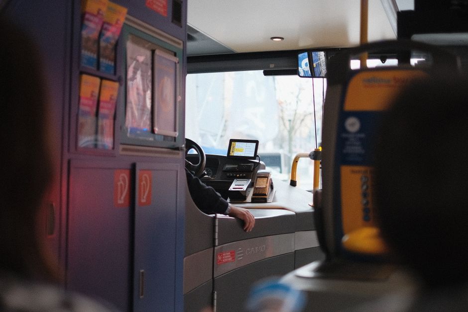 commuter arguing with bus driver