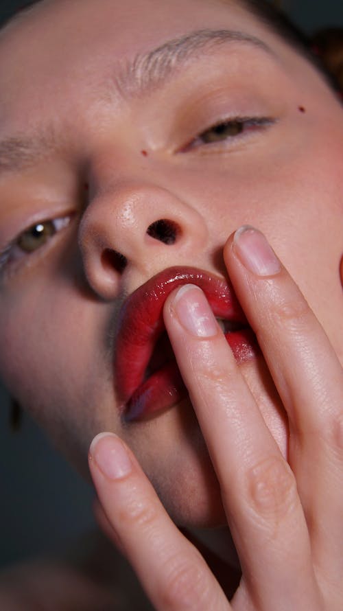 Woman Touching her Lips