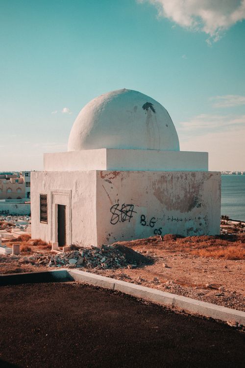 Free Explore the scenic white dome building in Mahdia, Tunisia, a symbol of Islamic architecture and culture. Stock Photo