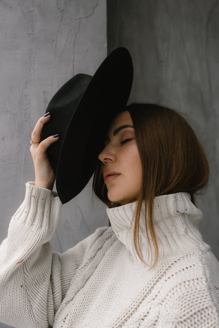 Woman Posing With Hat