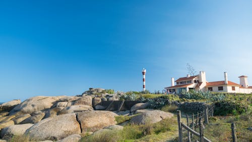 Foto profissional grátis de céu azul, céu limpo, costa