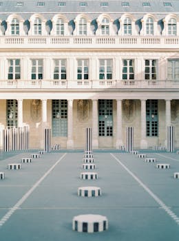 Art installation of Colonnes de Buren in the courtyard of Palais Royal, Paris.