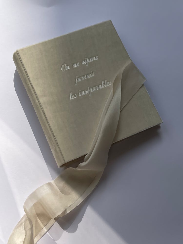 Ribbon Beside A Book