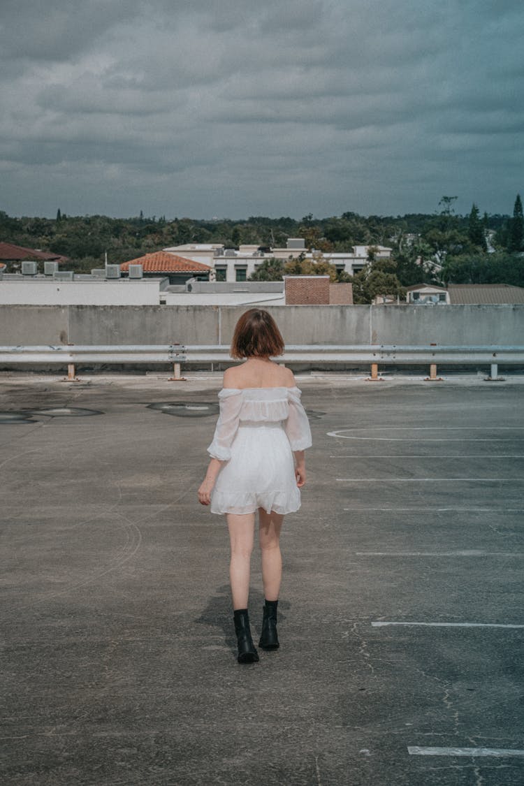 Woman In White Off Shoulder Dress