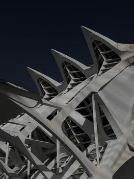 Modern architectural structure with steel arches and geometric patterns.