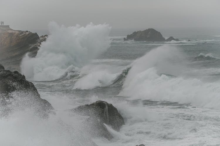 Photo Of Big Waves Crashing On Rocks