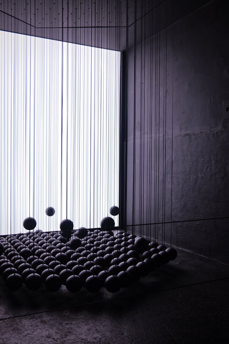 Hanging Balls In A Dark Room