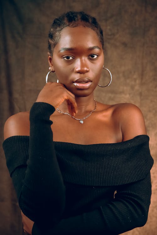 Model Posing in Black Dress