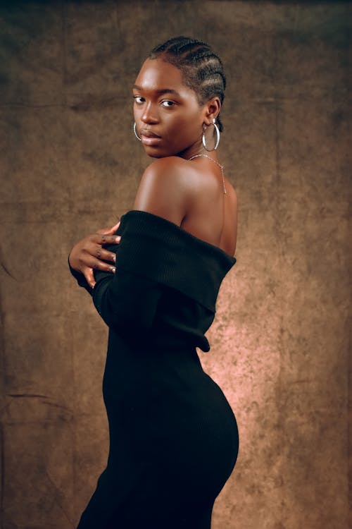 Model Posing in Elegant Black Dress