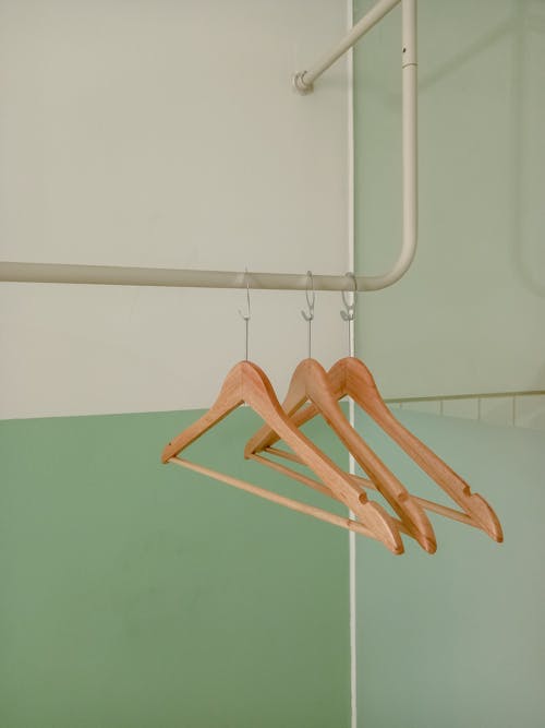 Wooden Hangers in Wardrobe