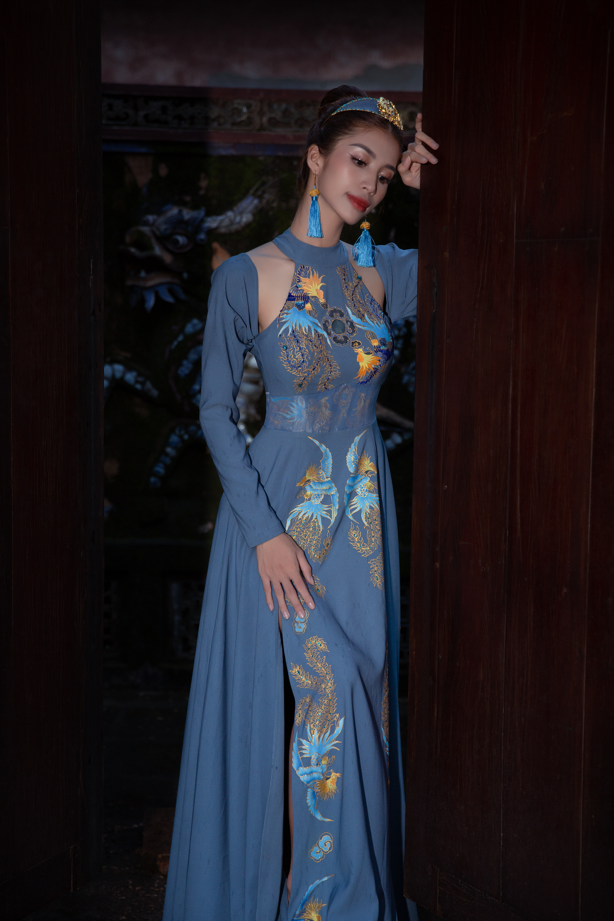 Woman in Blue Dress Leaning on a Wooden Door · Free Stock Photo