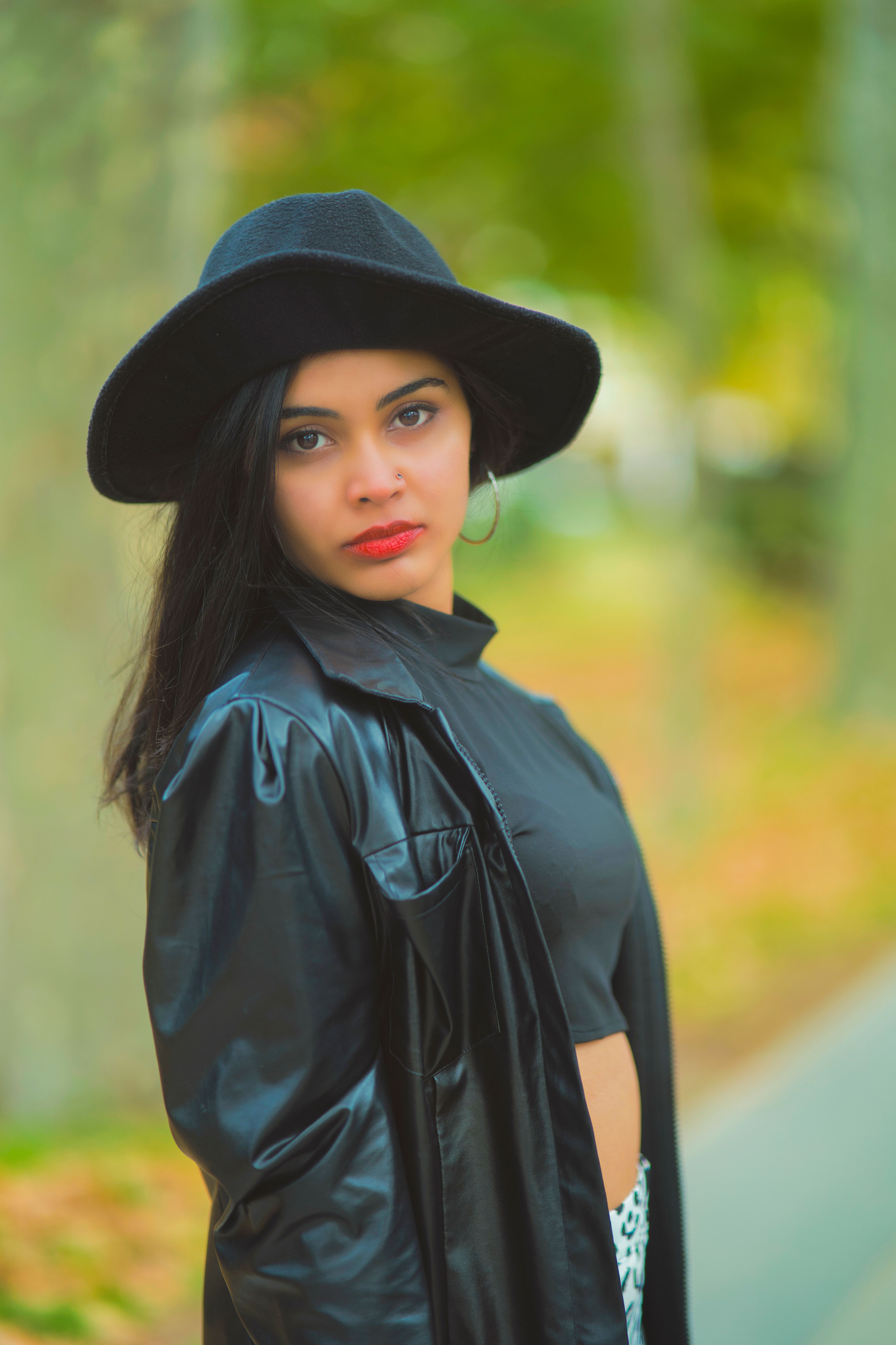 Woman in Black Leather Jacket and Black Hat · Free Stock Photo