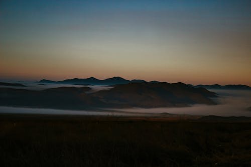 Mountains in Fog at Dawn