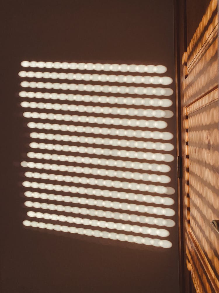 Sunlight And Shadow On Wall And Floor