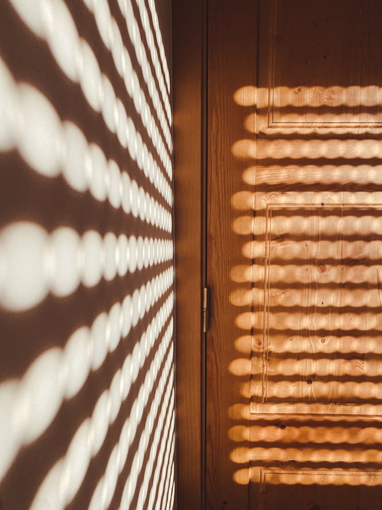 Shadow And Sunlight On Wall And Door