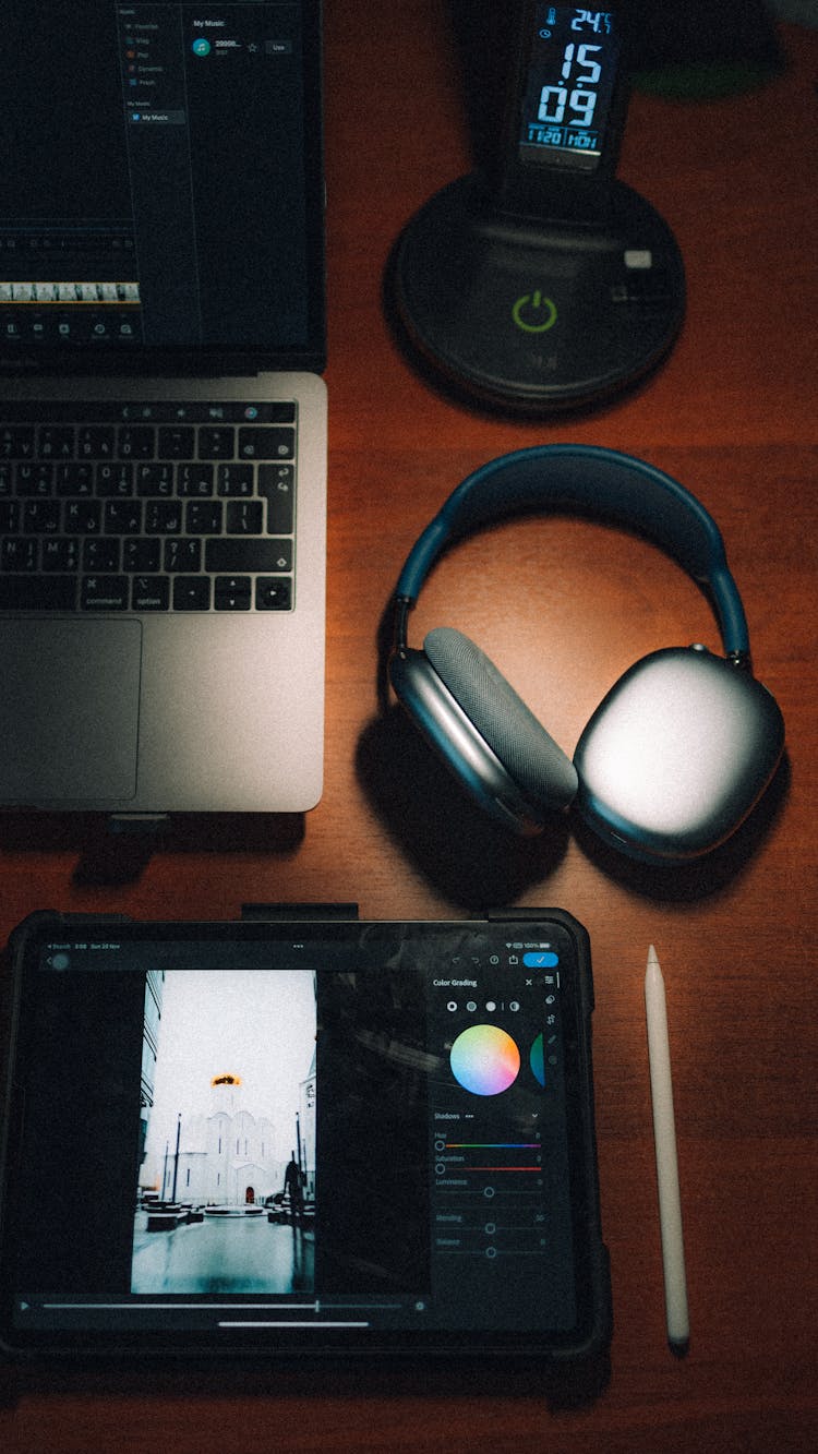 Modern Electronic Gadgets On Wooden Table