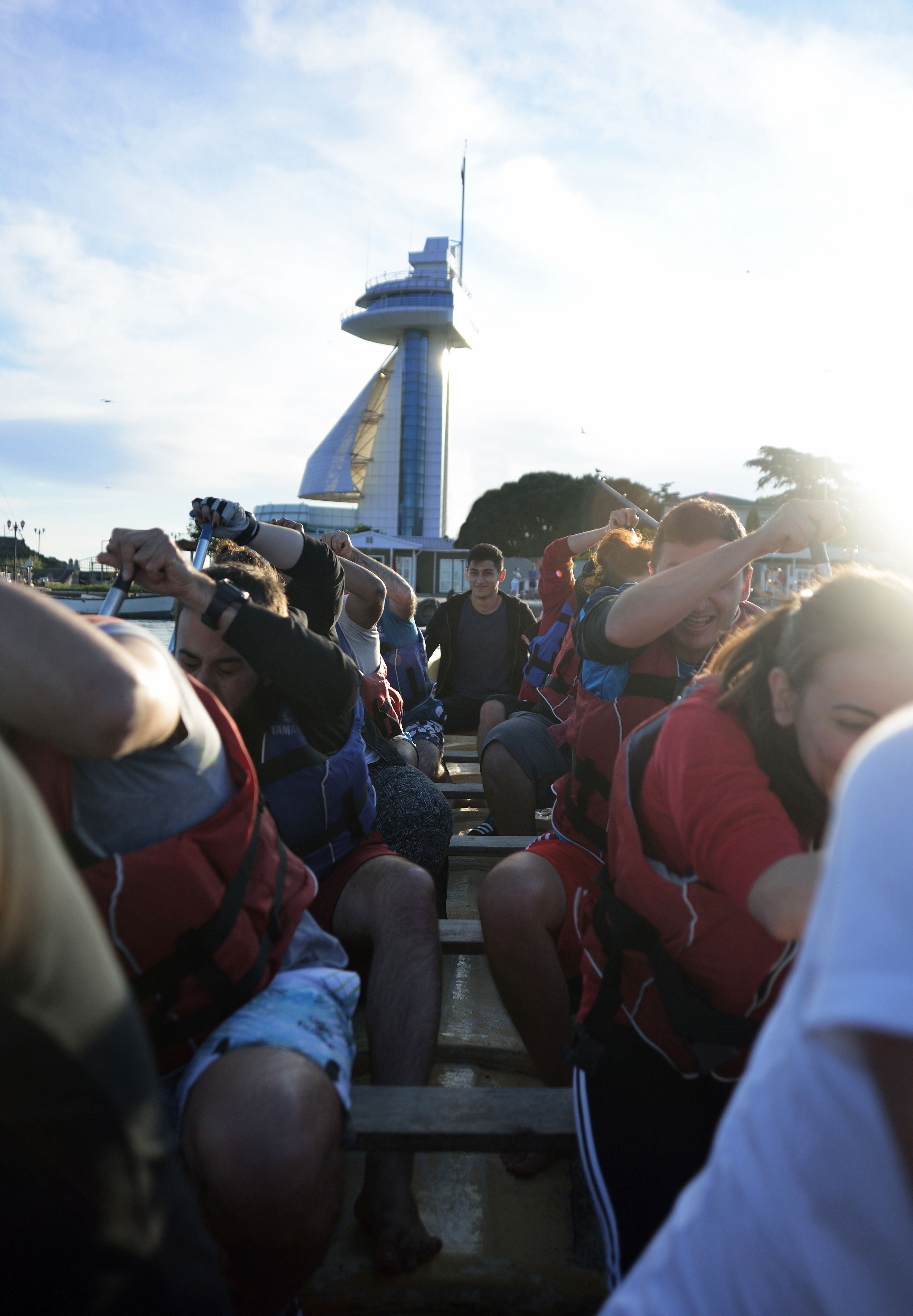 Group of People Riding and Paddling a Boat · Free Stock Photo