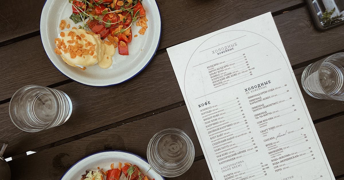 Plates and Menu on Table · Free Stock Photo