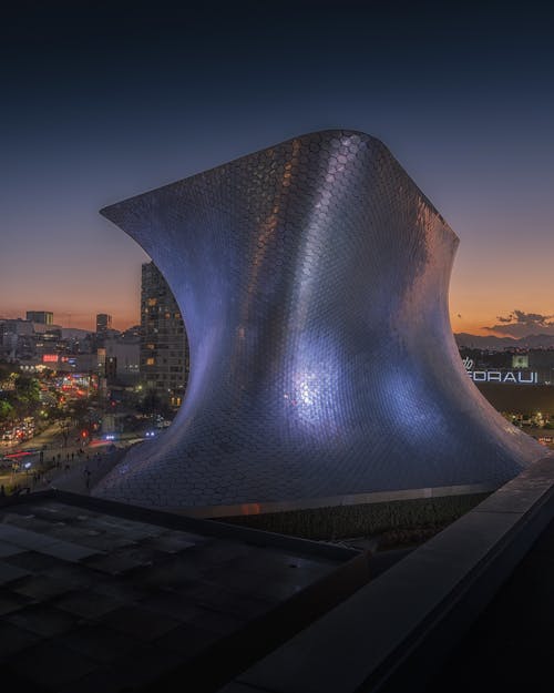 Futuristic Building in City at Sunset