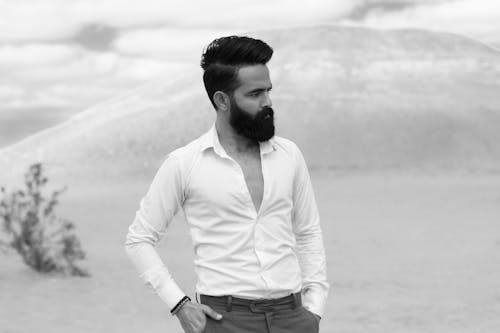 Grayscale Photo of Bearded Man in White Long Sleeves 