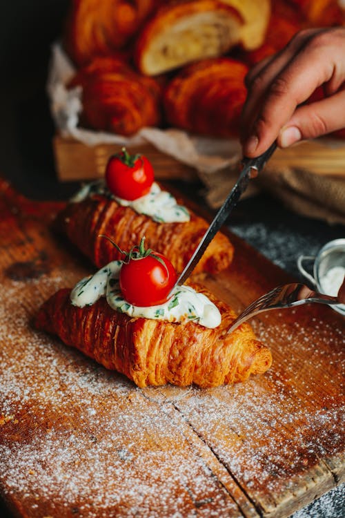  Croissant with Cream and Red Tomato on Top