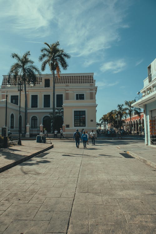 People Walking on Square in Town