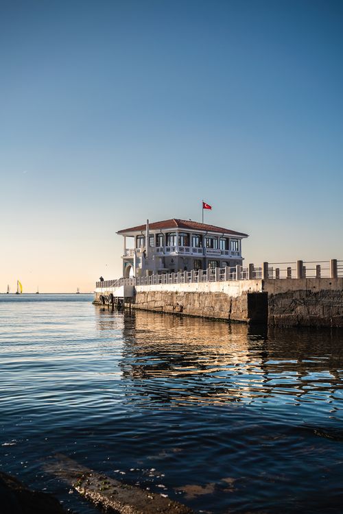 Free Charming view of Tarihi Moda İskelesi against a clear blue sky and calm sea in Istanbul, Turkey. Stock Photo